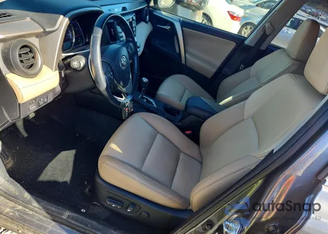 2015 Toyota Rav4 Limited z USA, uszkodzony, nr VIN JTMYFREV4FD049701